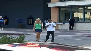 A blonde milf covers her big tits in cum to win over our friend