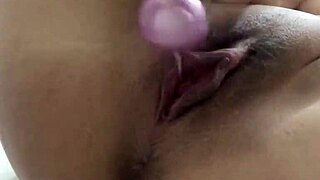 Chinese babe plays with bolas and vibrator in close detail.