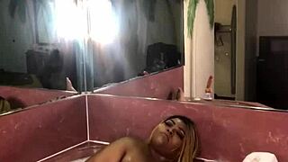 Zaharii, ebony bbw, masturbates her wet pussy in the hot tub