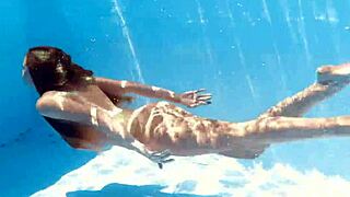 blonde babe ivi rein dives underwater naturally