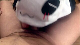 Panda eagerly sucks his friend's massive cock. Deepthroat action unfolds in homemade cosplay.