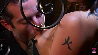 A girl with a tattoo and a black stocking gets smashed by a big cock