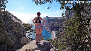 This stunning Russian girl flaunts her big ass by the sea. Her tight figure shines in public erotica.