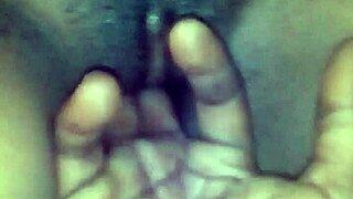 fingering her ebony pussy early morning.