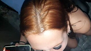 Young girl sucks her lover's cock while chatting with her boyfriend on the phone