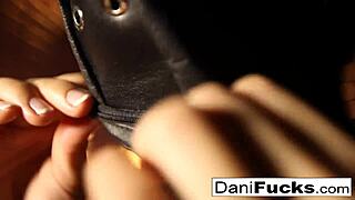 Sexy Dani Daniels masturbating in a cage.