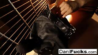 Sexy Dani Daniels masturbating in a cage.