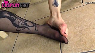 sexy barefoot devil in stockings teases with her feet 😈