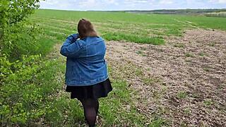 Titty and pussy sucking cock with drooling out in the field