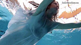 The first scene is about Andrejka, the Aqua girl, strip as she sensually and then take a swim underwater
