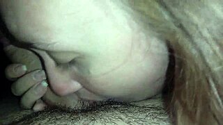 The redhead eagerly performs a blowjob before the action