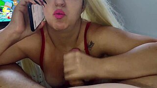 The blonde slut in miniskirt talks to her husband while sucking her lover's dick. She's so horny with that big ass.