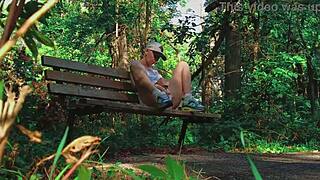 Blonde couple finds intense release in a quiet forest setting.