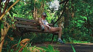 Blonde couple finds intense release in a quiet forest setting.