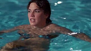 check out this sexy majorette in a bikini by the pool