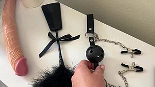 Horny milf tests a new masturbator on a masked dude before riding him.