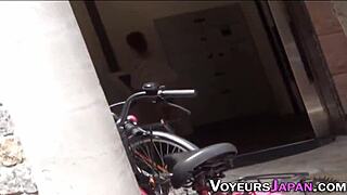 Asian babe fingers her hairy pussy outdoors in tight jeans