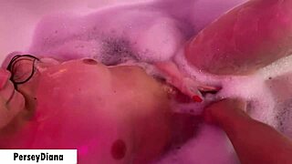 curvy girl with bubble butt relaxes in bath.