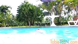 Tobie Teen Fingers Her Shaved Pussy by the Pool