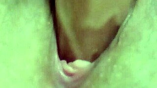 sexy hot milf fingers herself dildo