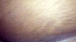 Bent over for doggystyle, her black ass shines in homemade action. It’s raw and real.