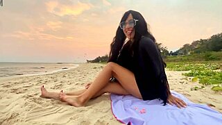 beautiful girl enjoys beach vibes and sunsets 🌅