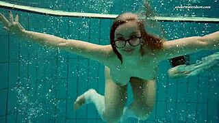 dasha submerged underwater in the pool
