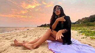 beautiful girl enjoys beach vibes and sunsets 🌅