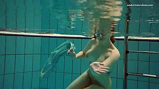 dasha submerged underwater in the pool