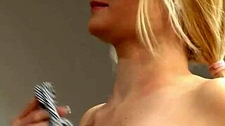 A blonde women bends over to have her huge black Melons crushed by a macho man