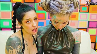 hey, wanna see tattooed latex sluts stretch their asses?