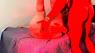 Submissive redhead cums tied to her dominator's cock