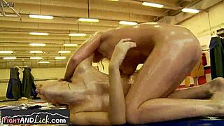 lesbian babes in bikini wrestling while oiled