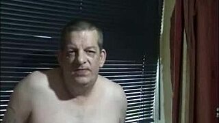 A shy amateur engages in homemade window masturbation in a solo bisexual setting