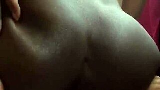 the ebony woman using a huge vibrator for solo squirting fun