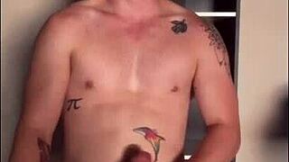 Twink relaxes in the sunlight outdoors.