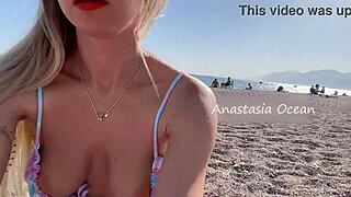 damn, i’m just stunned seein’ this sexy blonde strip nude on a public beach!