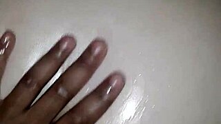 Oiled white girl experiences intense passion with big black cock