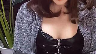 cute cat-eared japanese ladyboy jerks off dick