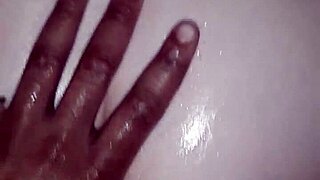 Oiled white girl experiences intense passion with big black cock