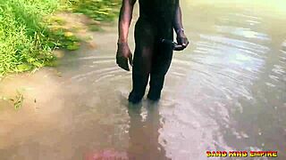 Outdoor orgasm scene with african native doctor and ebony amateur in the local river