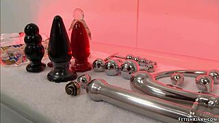 Artist fists blonde slave's asshole with her foot in kinky lesbian session