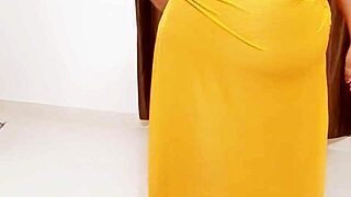 This african milf flaunts her big tits in a casual way