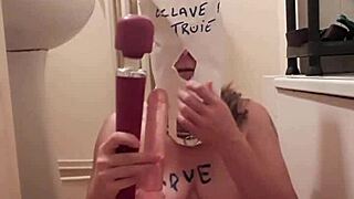 Female slave undergoes masked training session