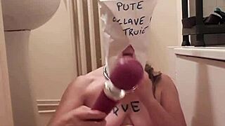 Female slave undergoes masked training session