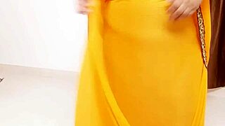 This african milf flaunts her big tits in a casual way