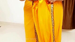 This african milf flaunts her big tits in a casual way