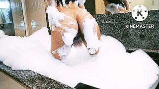 taking a relaxing bath in the bathtub with warm water and bubbles