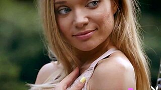 petite blonde teen zhenya belaya strips naked outdoors for a hot pose after steamy striptease