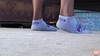 Black cougar indulges in puma socks fetish